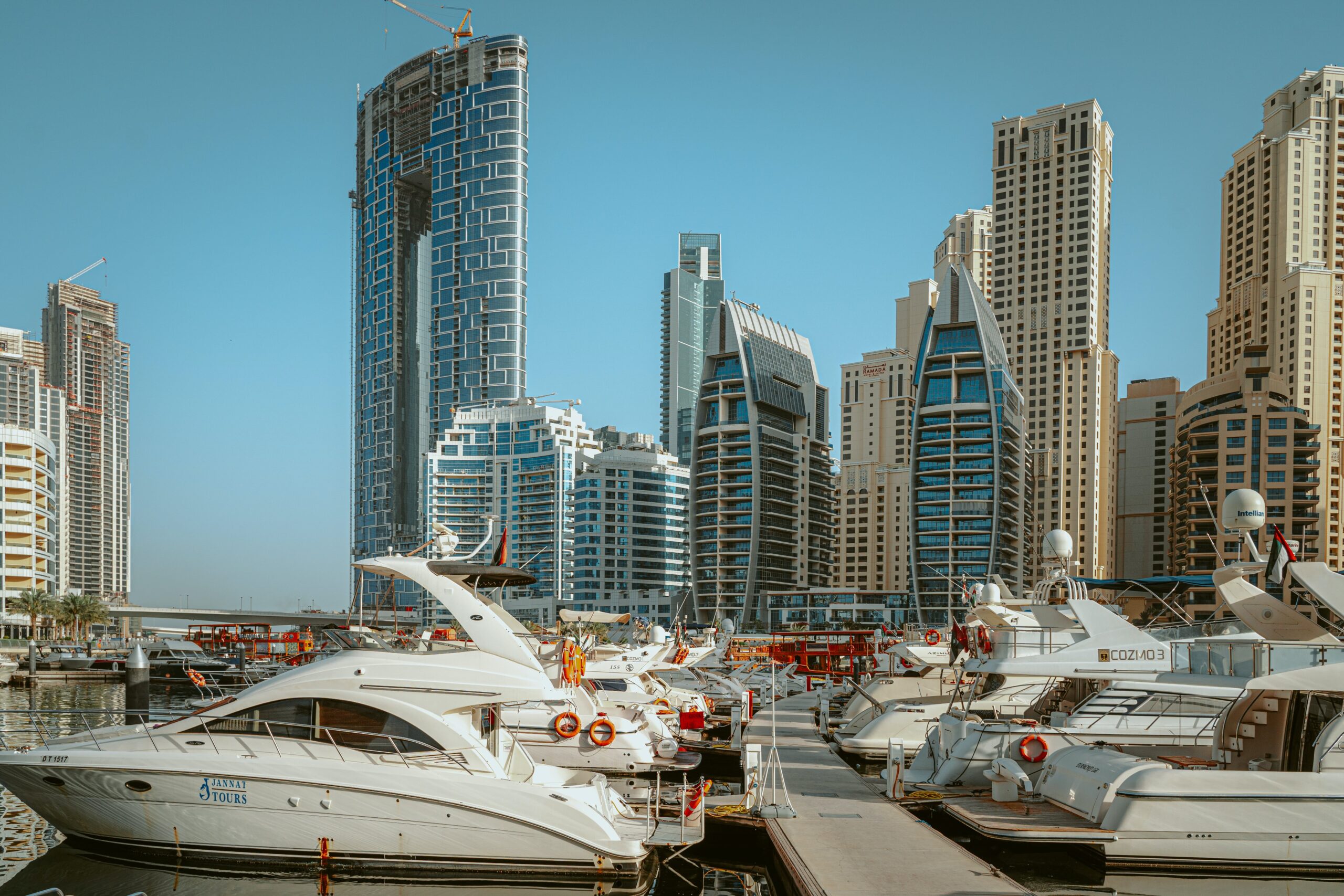 Explore Dubai Marina, Dubai's vibrant waterfront neighborhood, known for its iconic skyscrapers, shops, Yacht rent and exciting things to do